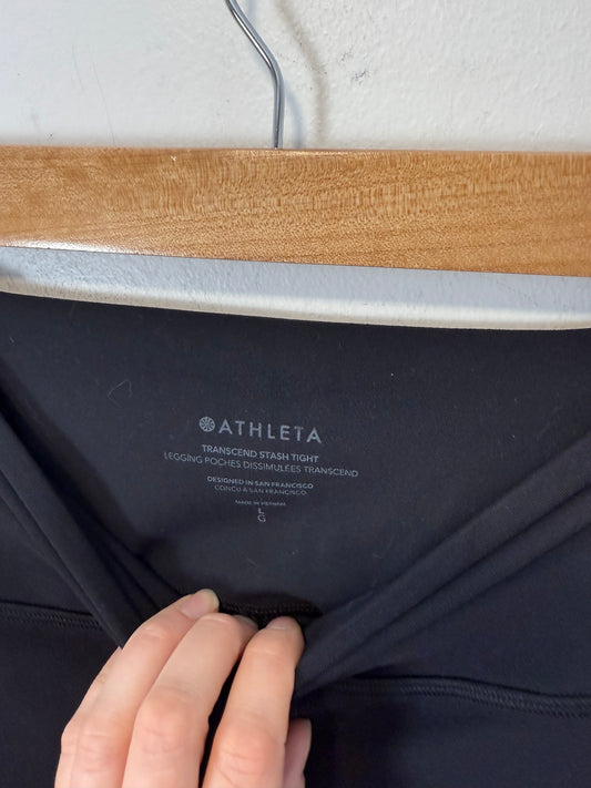 Athleta "Transcend Stash High Rise Legging in Black" (Size L)
