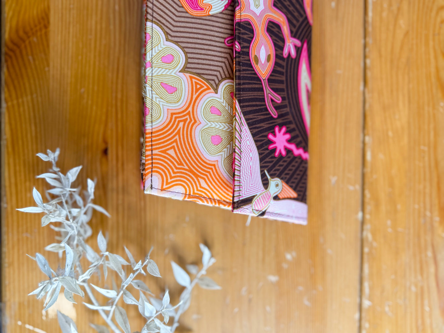 Pineda Covalin Patterned Clutch in Pink/Orange/Brown