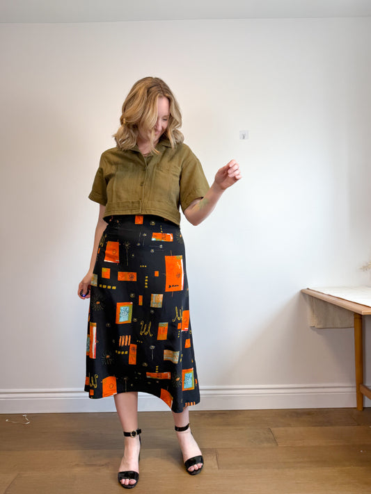 Vintage Abstract Floral Print Midi Skirt in Black/Orange (Size M)
