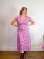 Faithful the Brand "Bellavista Midi Dress in Pink/Purple Floral" (Size L)