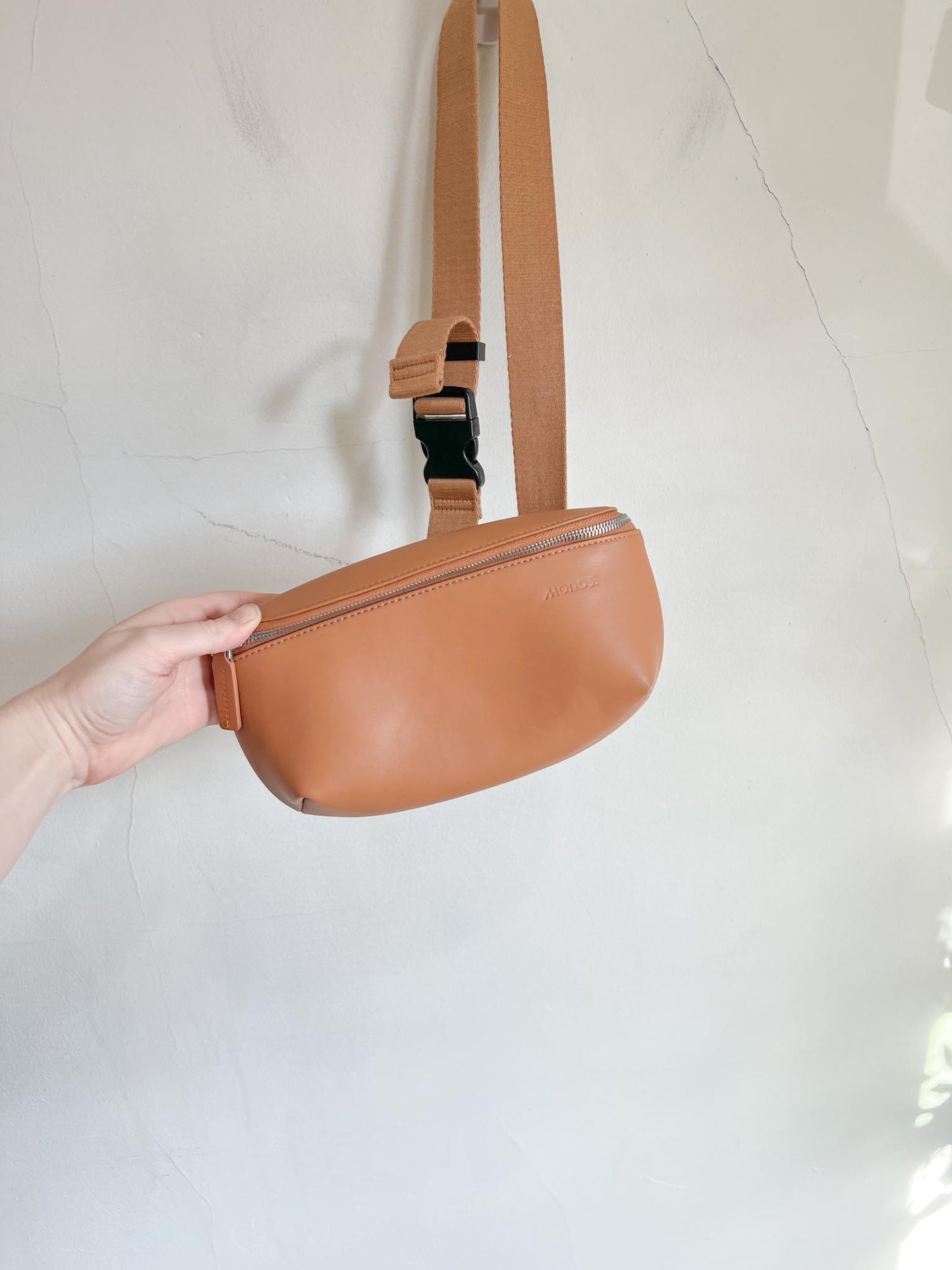 Monos: "Metro Sling Bag in Camel Brown"