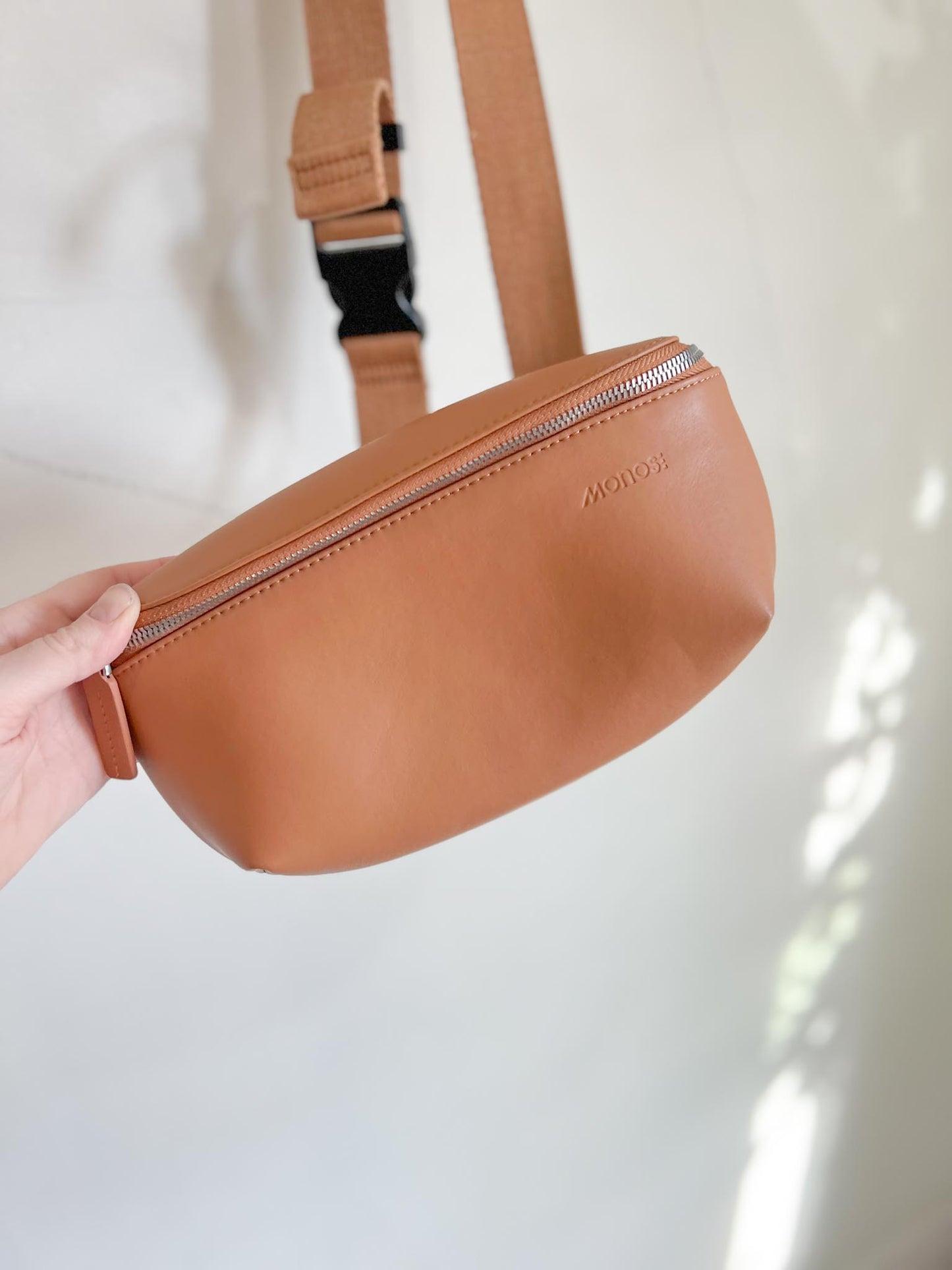 Monos: "Metro Sling Bag in Camel Brown"