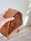 Monos: "Metro Sling Bag in Camel Brown"