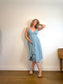Wilfred "Beaune Midi Pleated Wrap Dress in Pale Blue" (Size L)