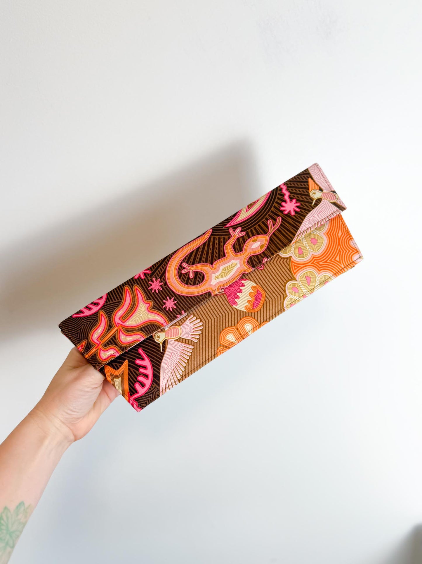 Pineda Covalin Patterned Clutch in Pink/Orange/Brown
