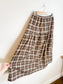 A Bronze Age Sustainable "Field Skirt in Brown/Blue Plaid" (Size M)