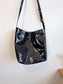 L’Intervalle Black Patent Crossbody Purse